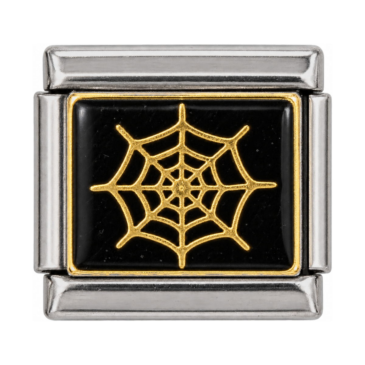 A gold-tone spiderweb on a black enamel tile.