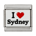 A red heart and Sydney lettering on a white tile.