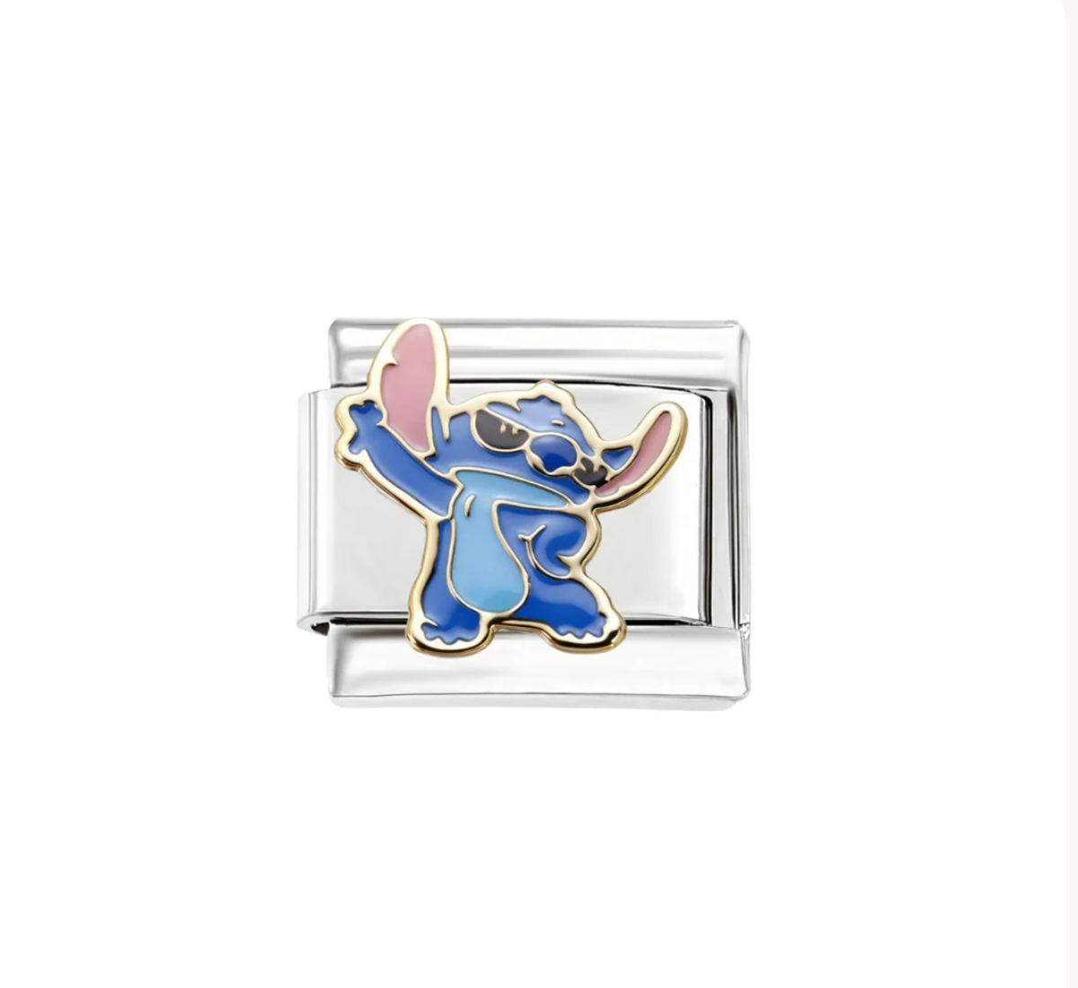 A blue Stitch design in a playful dancing pose on a silver-tone link. White background.