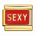 Red enamel with gold-tone SEXY lettering on a gold-tone link. White background.