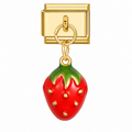 A glossy red strawberry with a green leafy top and gold-tone details, hanging from a gold-tone modular link. White background.